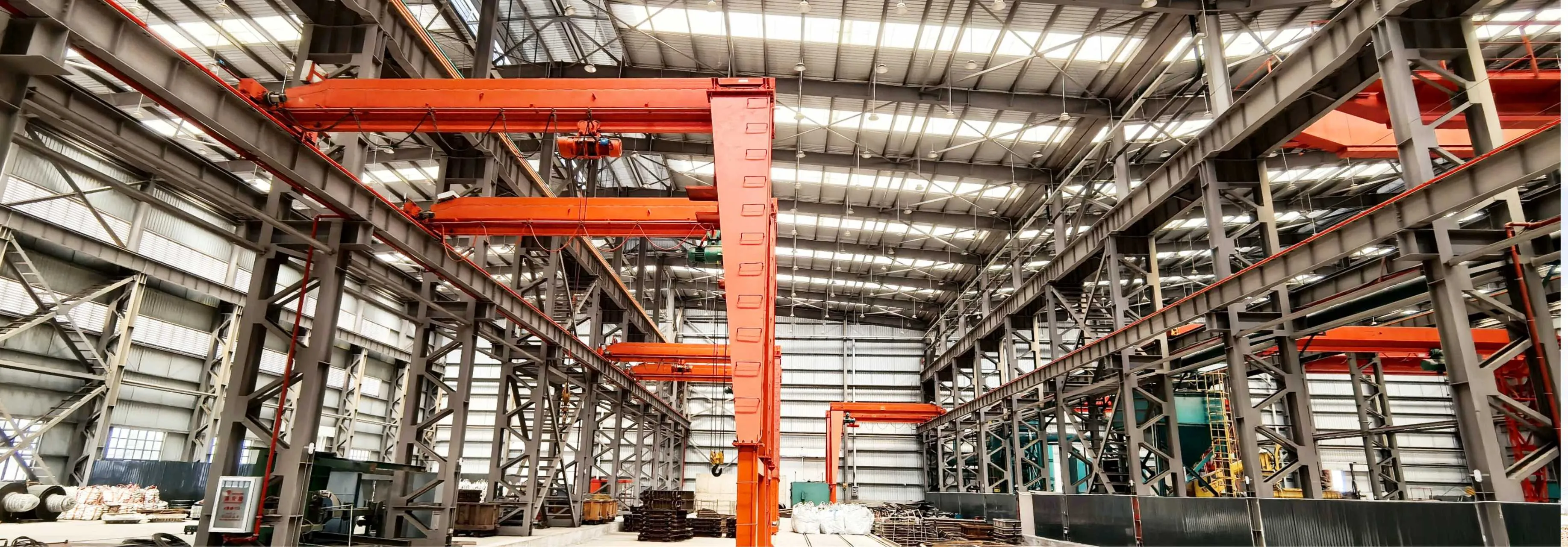 Interior of the ZL Wearparts foundry workshop with overhead cranes